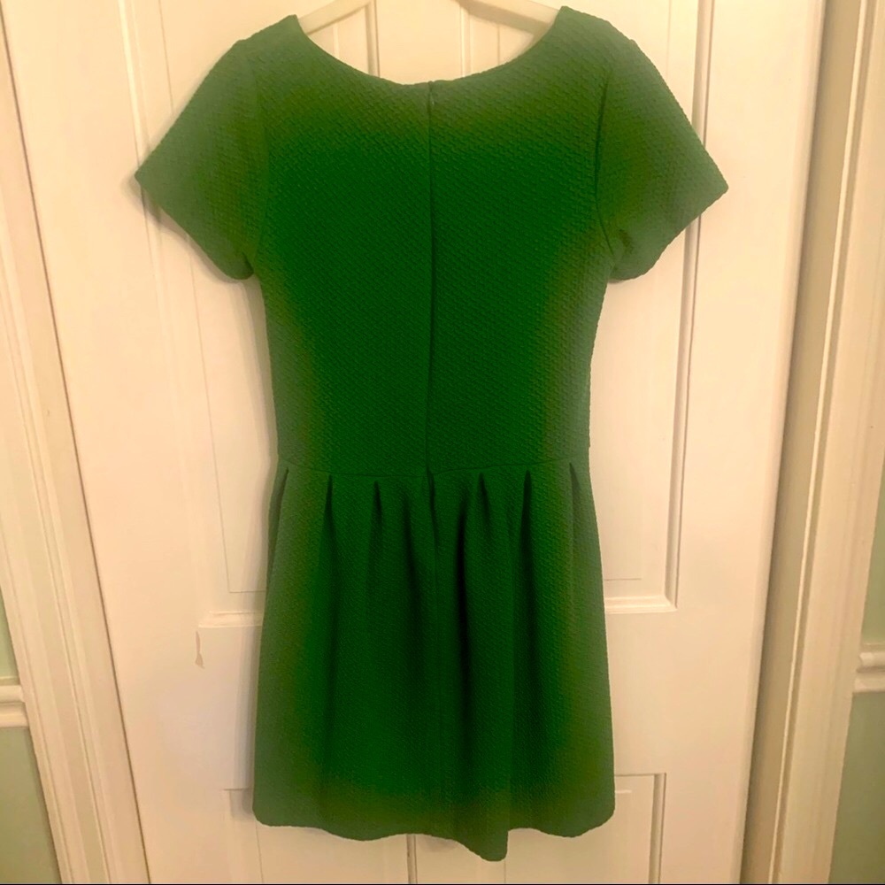 Anthropologie green pleated short sleeve dress.